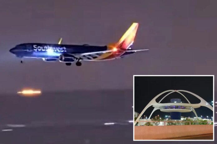 Video-shows-plane-abort-landing-at-last-second-as-heavy.jpg