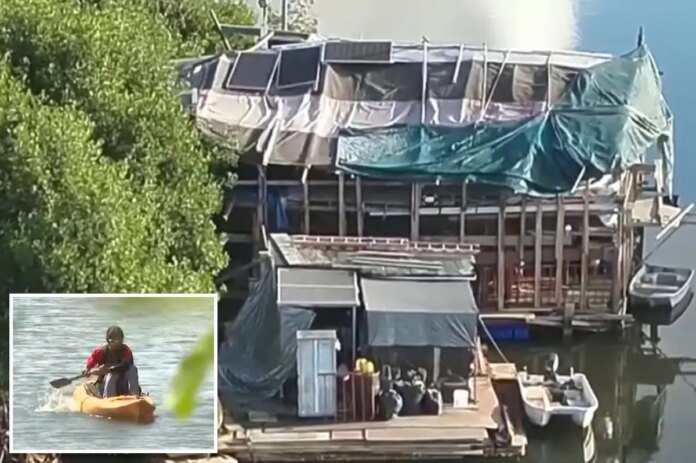 Hawaiis-homeless-avoid-encampment-sweeps-using-massive-two-story-houseboat.jpg