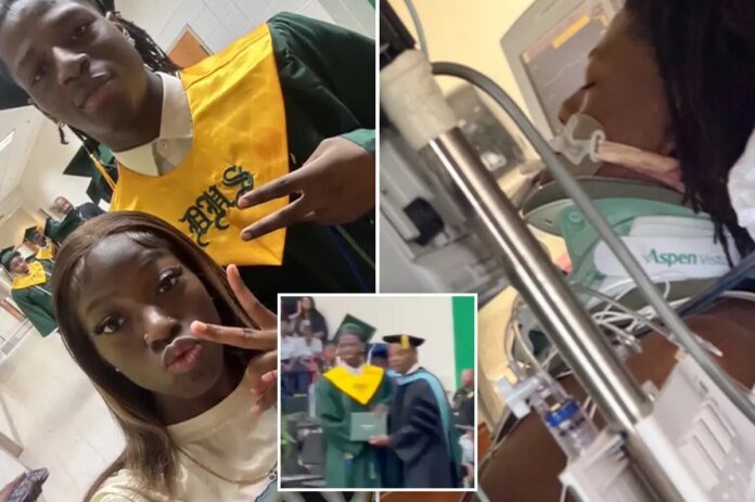 High-school-senior-shot-at-family-gathering-collects-diploma-with.jpg